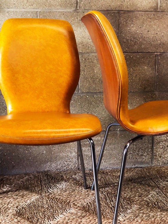 A 70s Pair of Orange & Chrome Dining Chairs