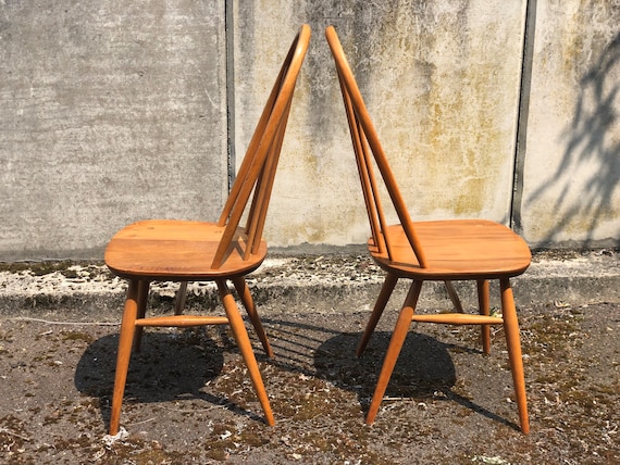 A Pair of Blond Ercol Windsor Hooped Back Dining Chairs Model No 365