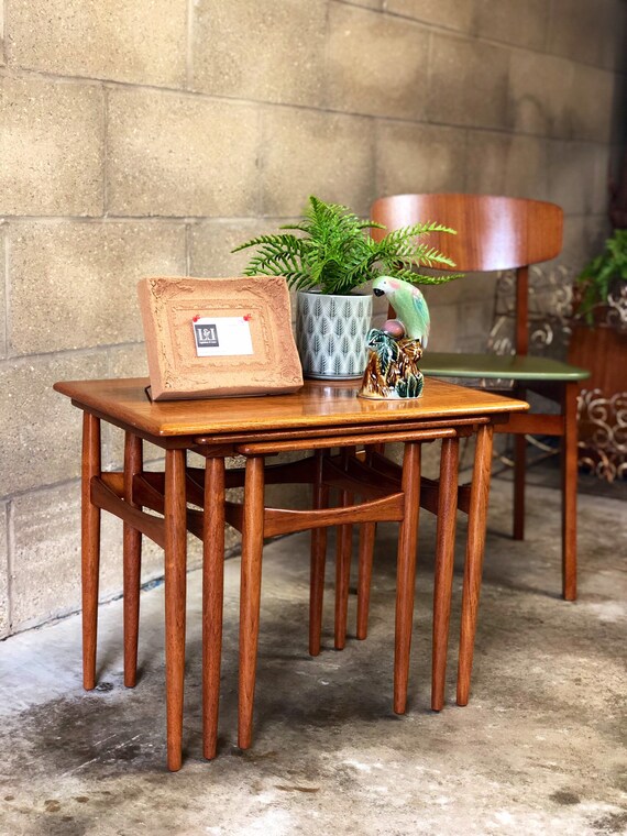 A Dainty Danish Vintage Nest of Tables designed by Poul Hundevad