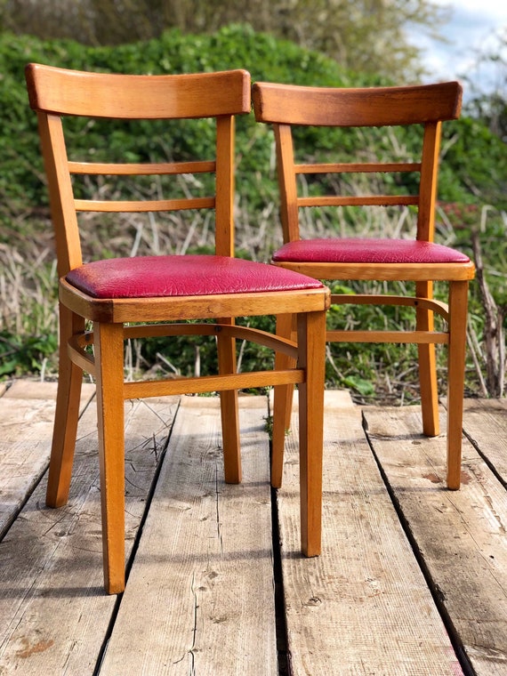 A Pair of Kitchen/Cafe Chairs newly Upholstered in RED Vinyl