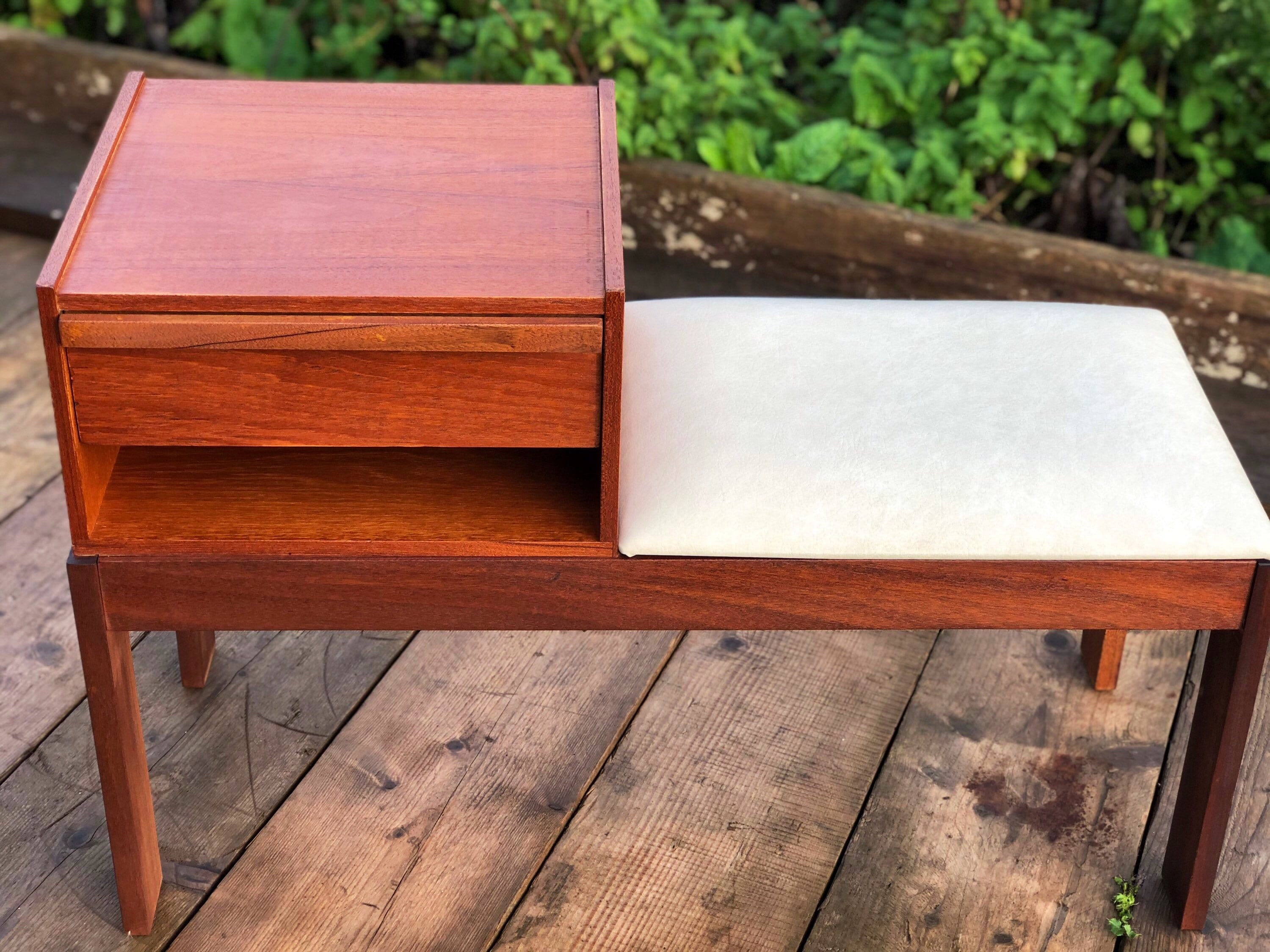 A Mid Century Little Chippy Telephone Table with Seat and Storage