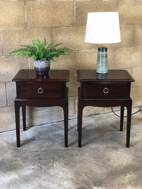 A Pair of Stag Bedside Tables with Drawers