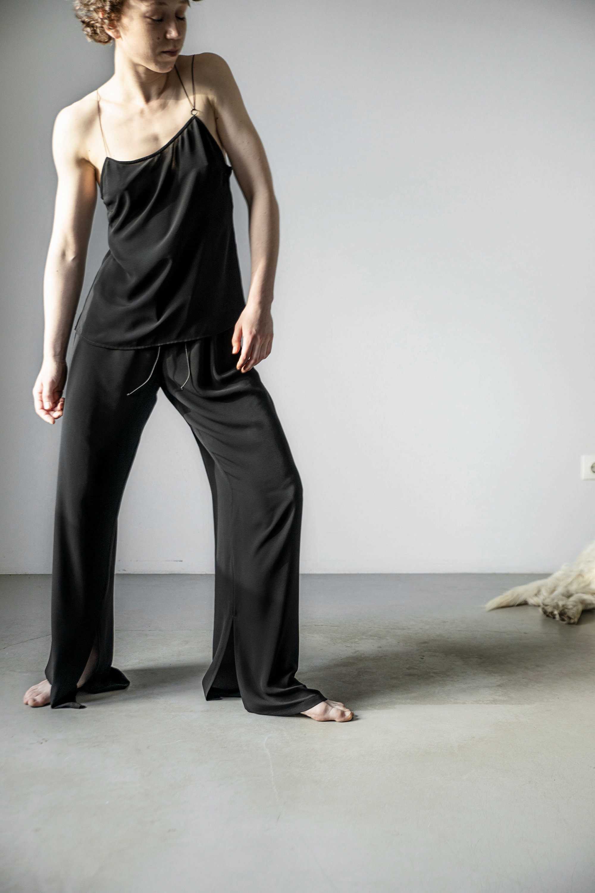 Black wide leg pants with slits sale