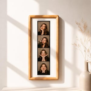 A framed collage of four photographs of a woman's face, each depicting a different expression or pose.