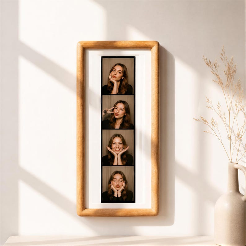 A framed collage of four photographs of a woman's face, each depicting a different expression or pose.