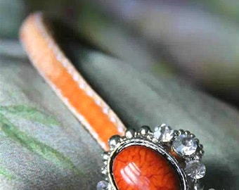 Handmade headband decorated with velvet ribbon and crystal