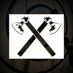 May include: A black and white graphic of two crossed axes. The axes have detailed blade designs and black handles, set against a white square. The background is a wooden surface with concentric circular patterns.