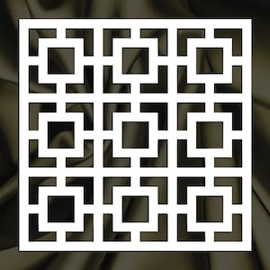 May include: White geometric design with a square shape and a repeating pattern of squares and rectangles. The design is cut out of a white material and is set against a dark brown background.