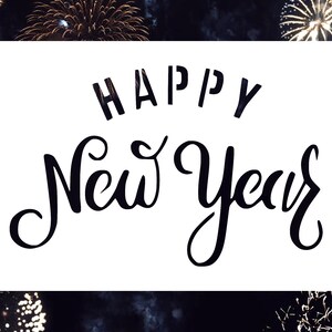 May include: A white card with black text that reads "Happy New Year" against a background of fireworks.