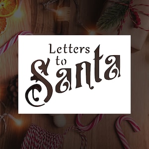 May include: A white sign with the text "Letters to Santa" in a decorative, brown font.
