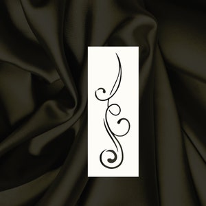 May include: A black and white decorative design featuring a stylized floral motif with swirling lines and curves.