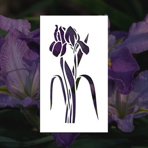 May include: A black and white silhouette of an iris flower with three blooms and leaves.