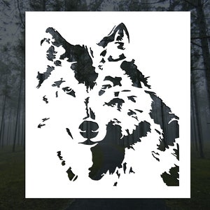 May include: Black and white stencil of a wolf's head. The wolf's face is detailed with fur and a sharp nose.