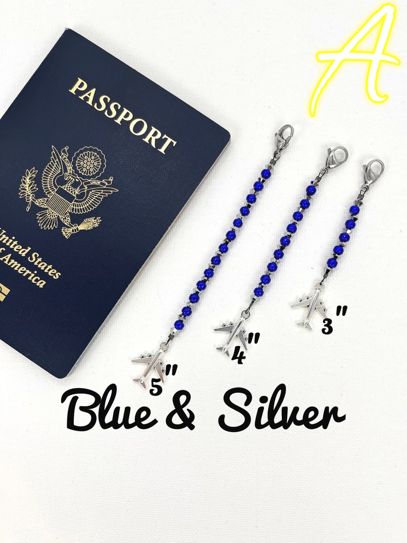 May include: Three blue and silver airplane luggage tags with silver airplane charms. The tags are 3 inches, 4 inches, and 5 inches long. The text "Blue & Silver" is written below the tags.