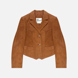 May include: A brown suede jacket with a classic collar, two front pockets, and button closures. The jacket features a tailored fit and a label with the text "Berman's".