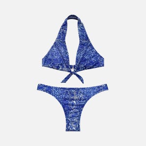 May include: A two-piece bikini set featuring a vibrant blue and white snakeskin pattern. The top is a halter style with a front tie closure, and the bottom is a high-cut bikini brief. The fabric displays a consistent reptilian scale print.
