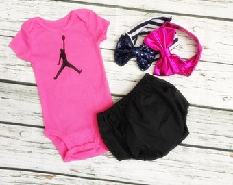 baby girl with jordans