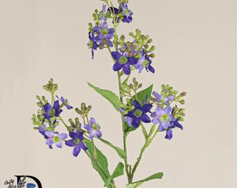 May include: A faux floral stem featuring multiple five-petaled flowers in shades of deep purple and light violet, accompanied by small green buds and slender green leaves on a central stalk. The logo DOZEN is visible in the bottom left corner.