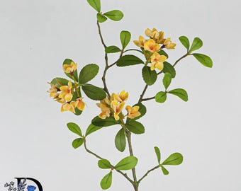 May include: A decorative artificial branch featuring clusters of small, vibrant yellow flowers with orange centers and numerous green, oval-shaped leaves with serrated edges. The stem is brown and slender, branching out into multiple segments.
