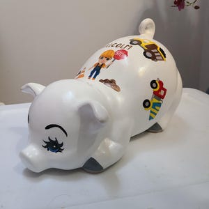 Large painted piggy construction theme piggy bank