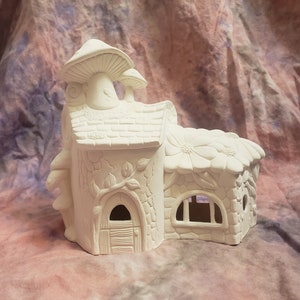 Paint your own floral fairy house with mushroom