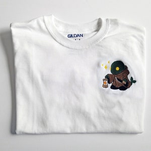Final Fantasy - Tonberry: Machine Embroidery Graphic T-shirt, Sustainable Street Fashion, Graphic Tee