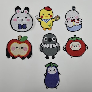 Puede incluir: Conjunto de 8 parches bordados para planchar con diferentes personajes de dibujos animados lindos, que incluyen un conejo, un pollito, un fantasma, una manzana, un pájaro, un tomate y una berenjena.