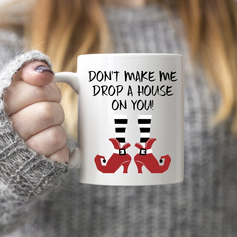 Don't Make Me Drop A House On You Funny Witch Halloween Coffee Mug - Red Shoes - Black and White Striped Socks - Humor Novelty Mug 