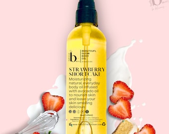 May include: A 125 ml bottle of Strawberry Shortcake body oil. The bottle is clear and yellow, with a black pump top. The label is white with black text and features a strawberry design. The text on the label reads "BEAUTIFUL GLOW BODY OIL" and "STRAWBERRY SHORTCAKE".