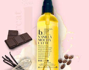 May include: A 4 ounce (125 ml) bottle of vanilla mocha latte body oil. The bottle is yellow and has a black pump top. The label is white with black text and features a stylized coffee bean and vanilla bean.