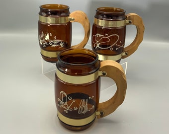 Vintage Siesta Ware 6 Small Amber Glass Souvenirs Seattle and Cowboy Boots with Wooden Handle Set of Two Vintage Siesta Ware 6 Small Amber Glass Souvenirs Seattle and Cowboy Boots with Wooden Handle Set of Two