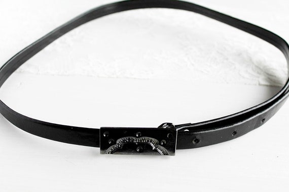 thin black waist belt