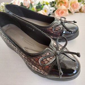 Material: Eko and patent Leather
Heel Height 1.57 in/4 cm
Womens Leather Loafers
Latex Foam Comfort Cushion Footbed
Slip-resistant  Sole