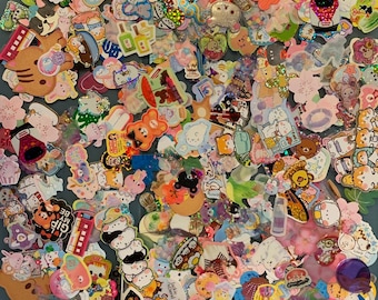 May include: A large collection of colourful and whimsical stickers featuring cartoon animals, food, and other cute designs. The stickers are perfect for decorating journals, planners, laptops, and other items.