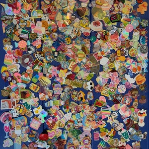 May include: A large collection of colorful, cartoon-themed stickers. The stickers feature various designs, including food, animals, and characters. The stickers are arranged in a random pattern on a blue background.