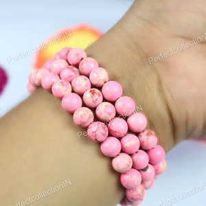 Handmade Pink Thulite Bracelet: 8mm Smooth Gemstone Beads