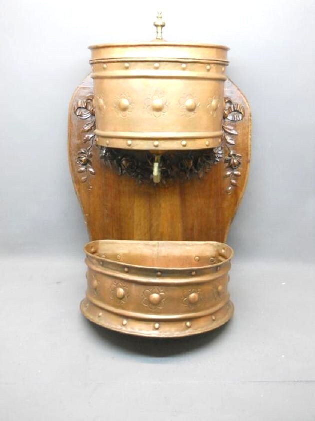 Old Copper Fountain With Its Basin