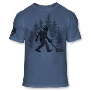 Bigfoot Metal Detector T-Shirt - Funny Sasquatch Metal Detecting shirt - Bigfoot Detectorist shirt - Athletic Soft Blend Tee - A187 Heather Royal Blue