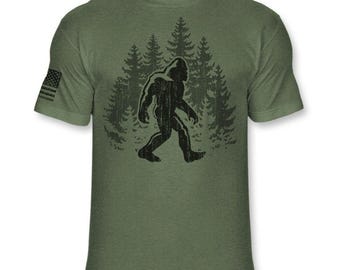 Bigfoot T-Shirt, Funny Sasquatch Forest Silhouette Shirt, Yeti Big Foot Walking in The Trees - Soft Blend Athletic Tee - A166