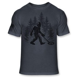 Bigfoot Metal Detector T-Shirt - Funny Sasquatch Metal Detecting shirt - Bigfoot Detectorist shirt - Athletic Soft Blend Tee - A187 Heather Navy Blue
