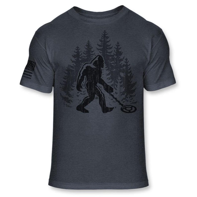 Bigfoot Metal Detector T-Shirt - Funny Sasquatch Metal Detecting shirt - Bigfoot Detectorist shirt - Athletic Soft Blend Tee - A187 Heather Navy Blue