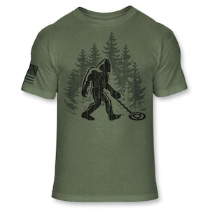 Bigfoot Metal Detector T-Shirt - Funny Sasquatch Metal Detecting shirt - Bigfoot Detectorist shirt - Athletic Soft Blend Tee - A187 Heather Army Green