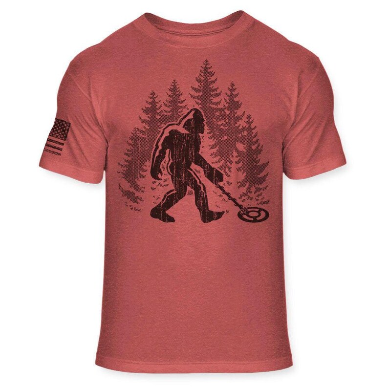 Bigfoot Metal Detector T-Shirt - Funny Sasquatch Metal Detecting shirt - Bigfoot Detectorist shirt - Athletic Soft Blend Tee - A187 Heather Red