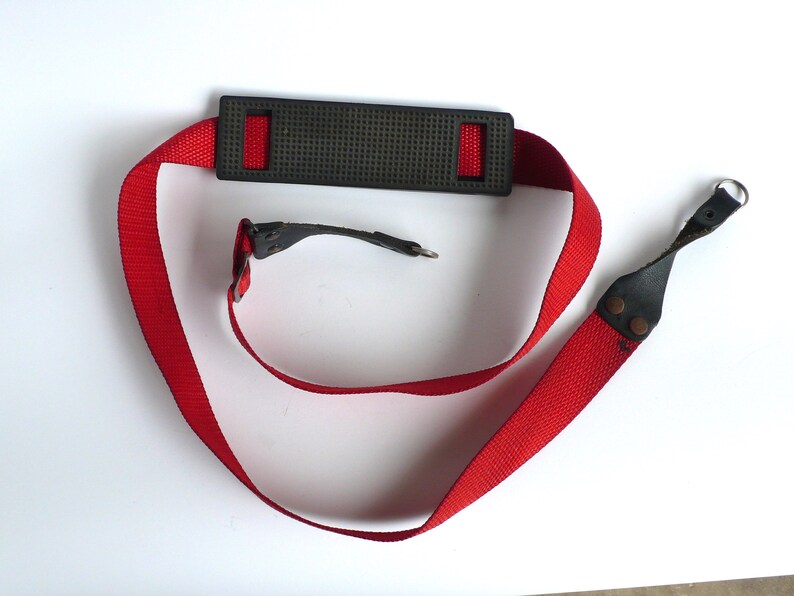 Red Camera Strap with Rubber Shoulder Thingy