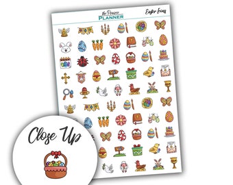 May include: A sheet of Easter-themed stickers featuring a variety of colorful icons, including eggs, bunnies, crosses, flowers, and baskets. The stickers are designed for use in planners and journals.