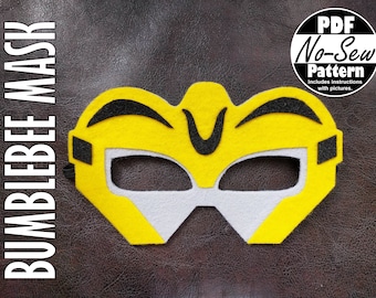 May include: A yellow felt Bumblebee mask with black eyes and a black V-shaped design on the forehead. The mask is a no-sew pattern with instructions and pictures included.  PDF No-Sew Pattern.
