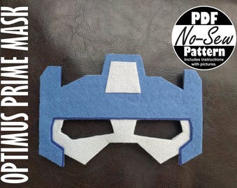 May include: Blue felt Optimus Prime mask with white felt details. PDF No-Sew Pattern includes instructions with pictures.