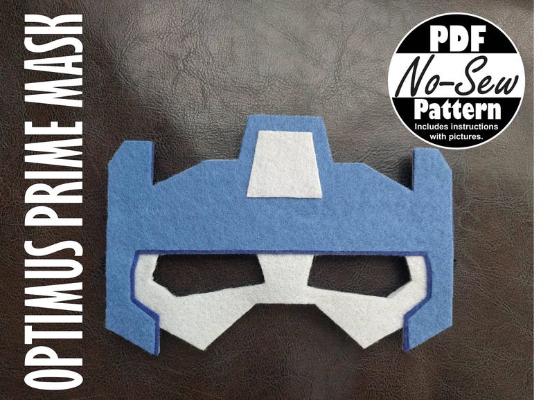 K&ouml;nnte beinhalten: Blaue Filz-Optimus Prime Maske mit wei&szlig;en Filzdetails. PDF-Schnittmuster ohne N&auml;hen mit Anleitung und Bildern.