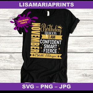 May include: Black t-shirt with gold text that reads "November Birthday Queen I Am Confident Smart Fierce +Still Dope+".