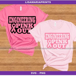 May include: Two pink t-shirts with the text "Engineering Pink Out" and a pink ribbon graphic. The text is in black and the ribbon is in pink.